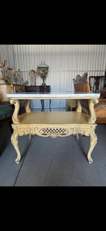 French Provincial style coffee table with marble top and carved wood base gallery