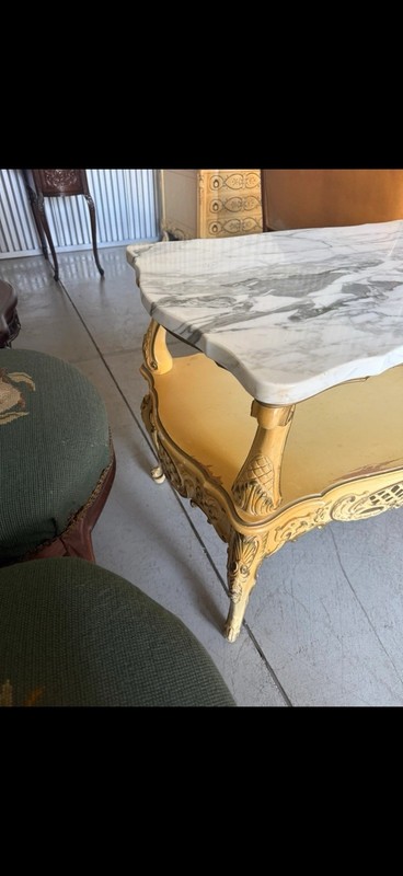 French Provincial style coffee table with marble top and carved wood base gallery