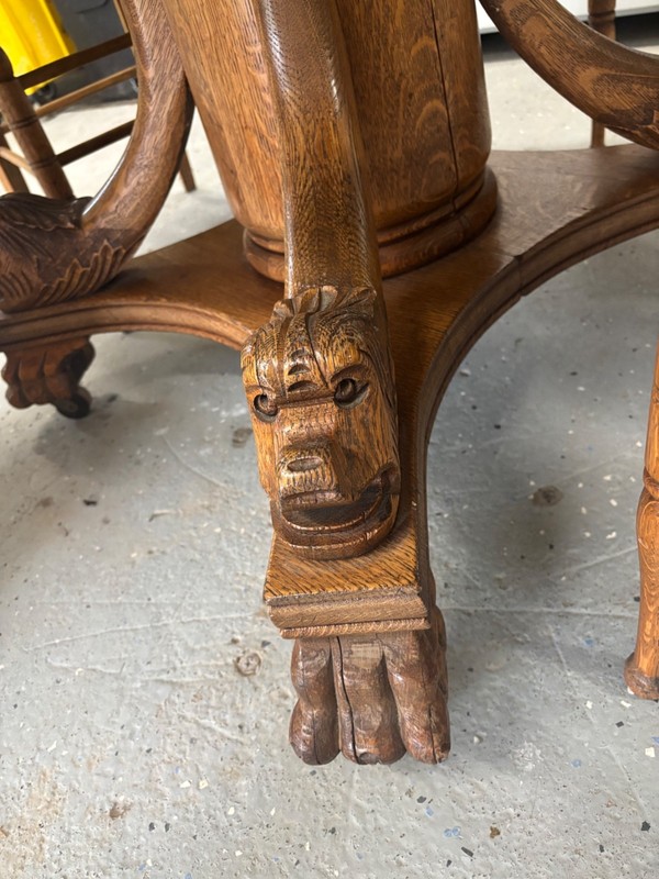 Victorian RJ Horner oak pedestal lion head table and chairs gallery