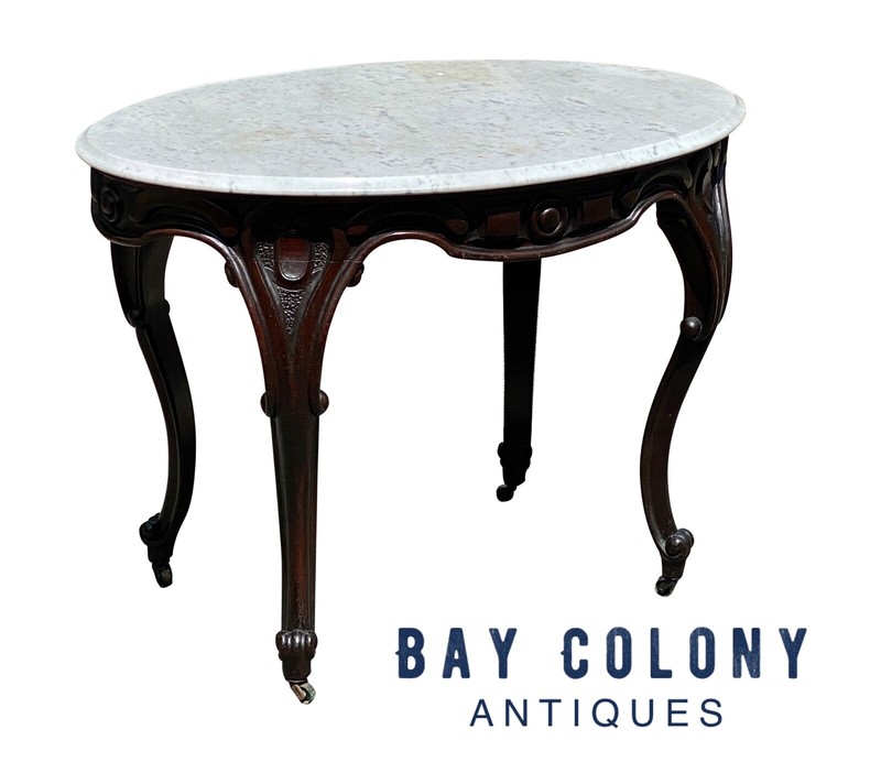 LATE 19TH CENTURY ANTIQUE VICTORIAN MARBLE TOP CARVED WALNUT OVAL PARLOR TABLE