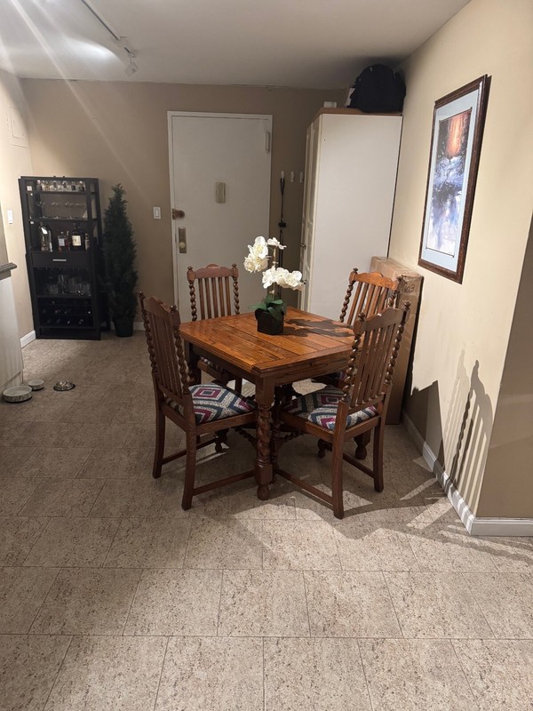 Antique extendable dining table with chairs