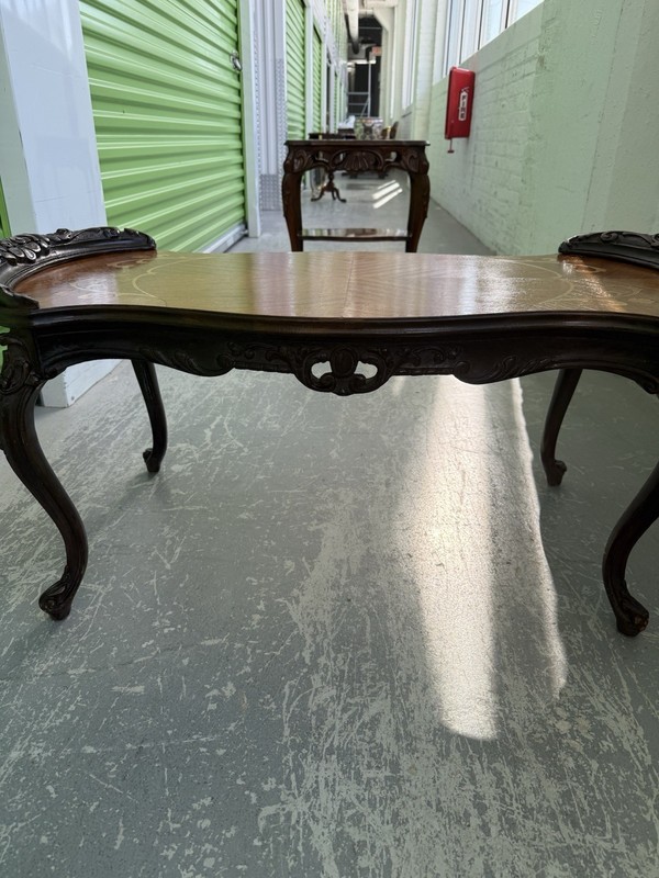 Carved wood coffee table with marquetry inlay, French Louis XV style