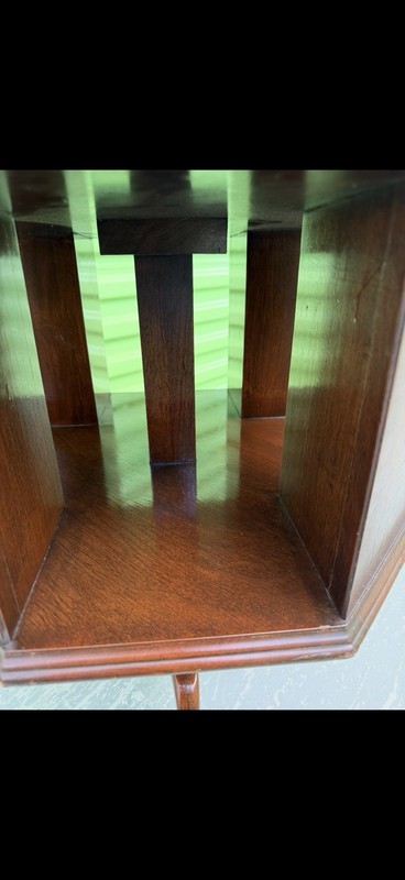 Mahogany octagonal revolving bookcase table with Queen Anne-style cabriole legs gallery