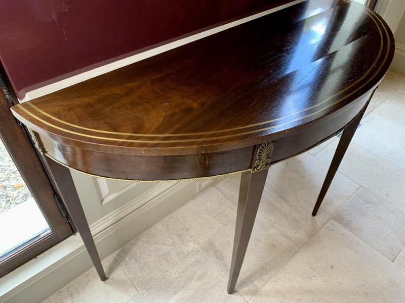Antique Demilune Console Tables With Brass Ormolu Mounts—A Pair gallery