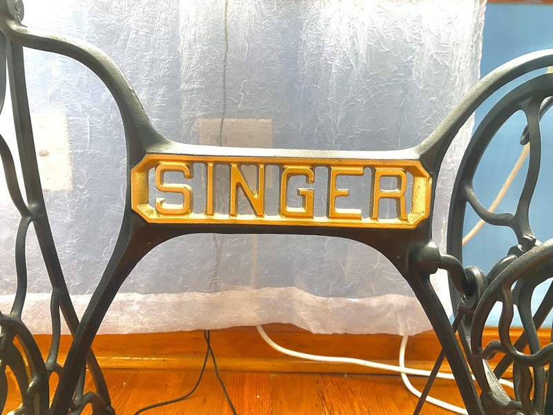 Singer modified table with glass top. gallery