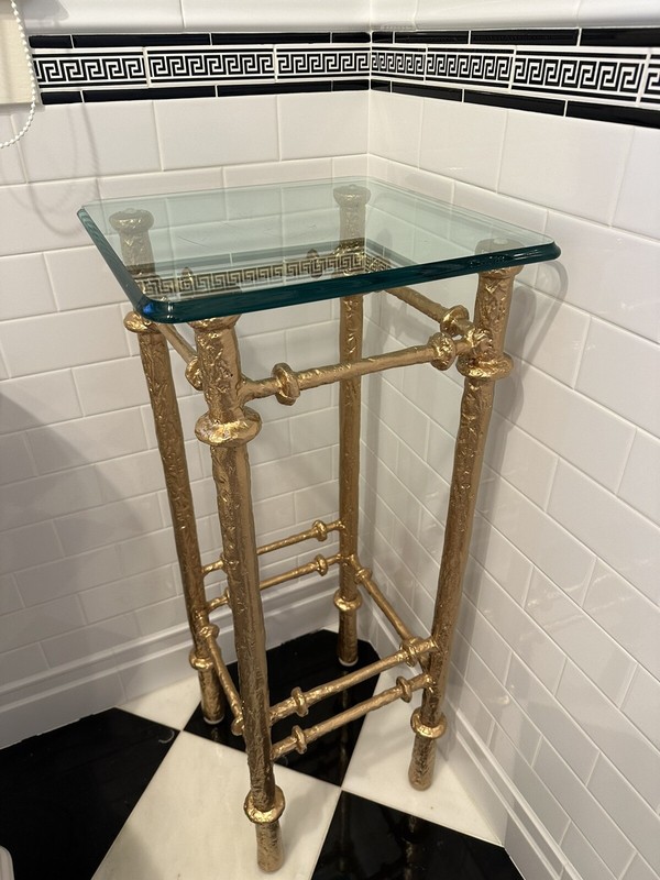 A Giacometti Style Gold Painted Cast Iron Pedestal Table