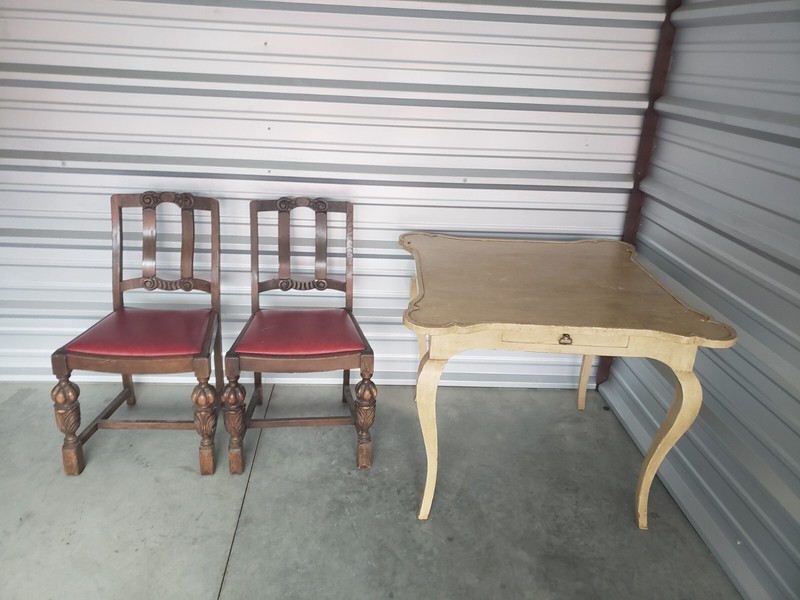 Minton Spidell Top Game Table And Two Red Chairs