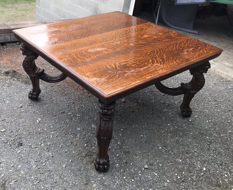 54″ CARVED GRIFFIN SQUARE OAK DINING TABLE, 2 LEAVES, ATTR. R.J. HORNER