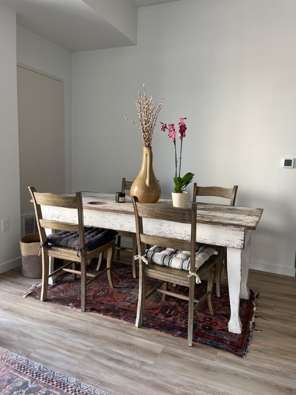 antique whitewashed dining table (farmhouse look) and matching modern chairs