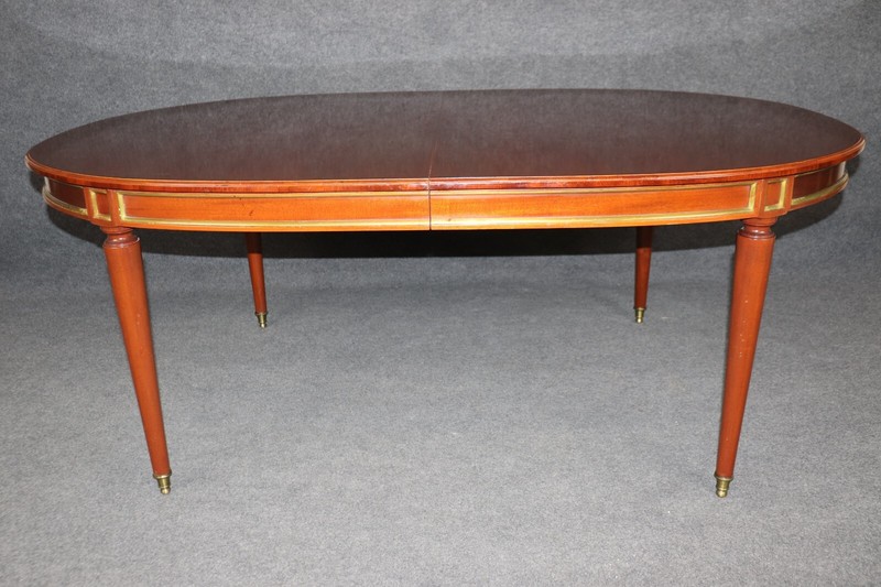Superb French-Made Maison Jansen Attributed Brass Mounted Mahogany Dining Table gallery