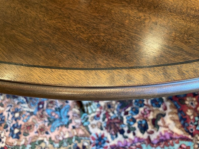 Henkel Harris Oval Mahogany Coffee or Cocktail Table with Brass Lion Claw Caps gallery