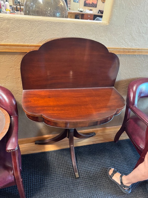 Victorian- or Regency‑style mahogany pedestal/fold-over card (or tilt‑top) table gallery