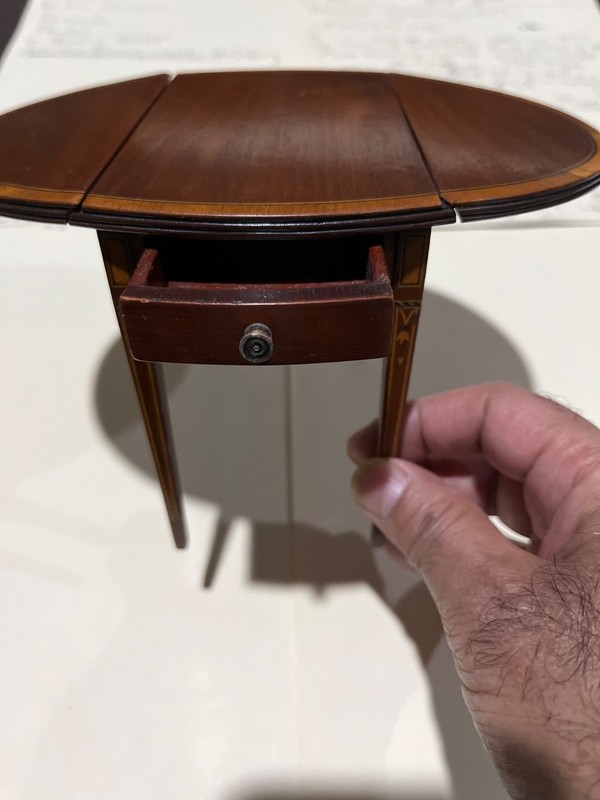 Vintage miniature drop leaf table and a vintage guilted hand painted mirror gallery