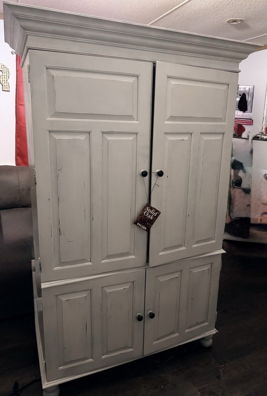 Keller solid oak armoire/entertainment center.