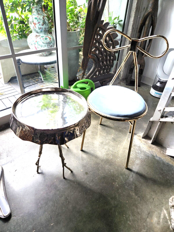 PAIR OF CHROMED METAL BRANCH TABLE AND BOW TIE CHAIR