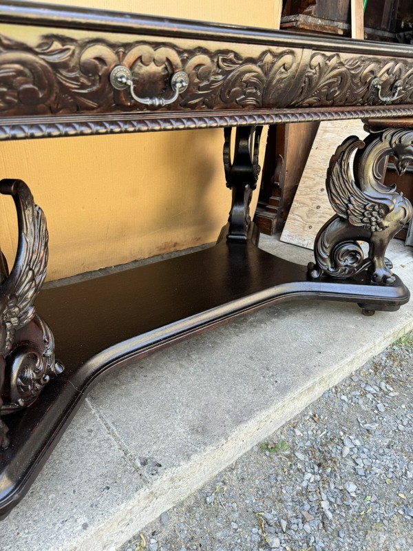 R. J. HORNER CARVED WINGED GRIFFIN LIBRARY TABLE gallery