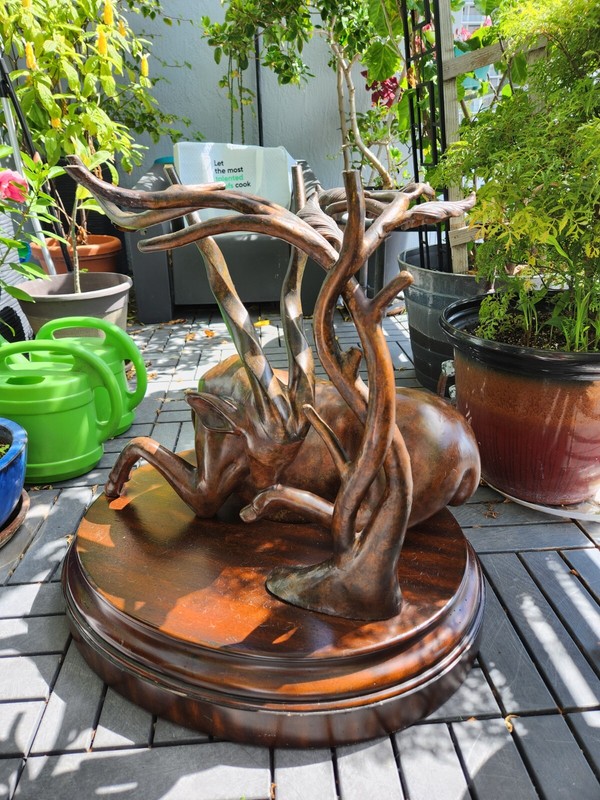 BRONZED GAZELLE TABLE ON WOOD BASE gallery
