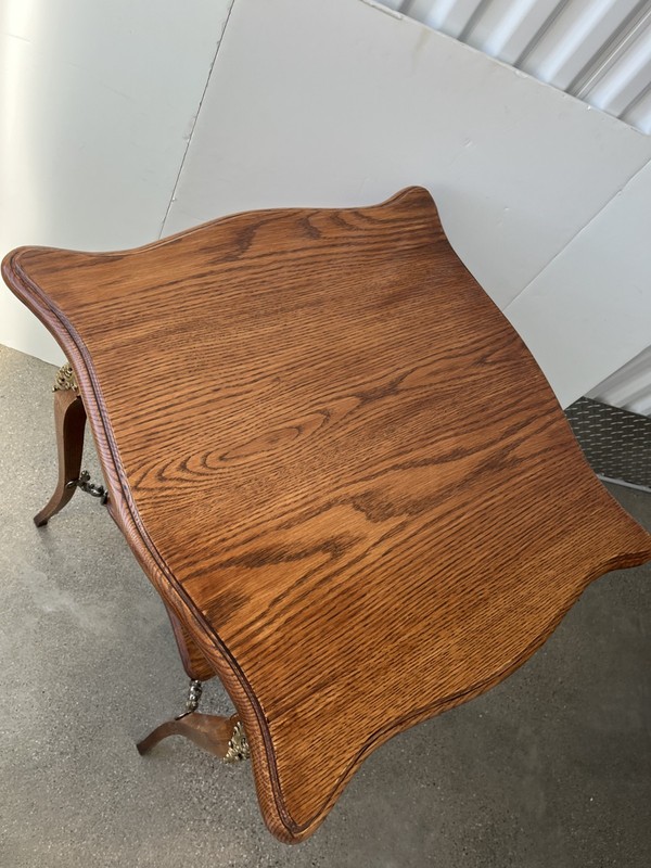 Antique French Louis XV oak accent table with shelf, ormolu and dolphin mounts gallery