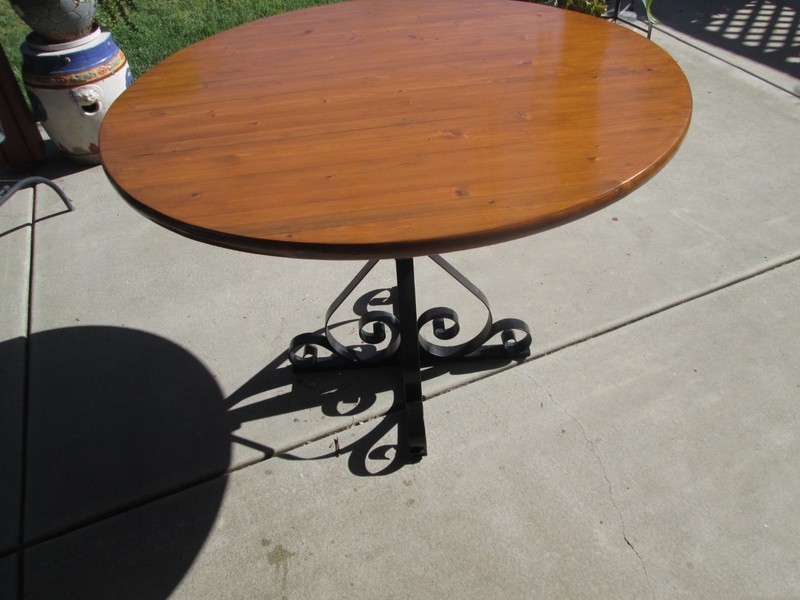 Vintage table scrolled wrought iron base w/round wood top dinning patio table gallery