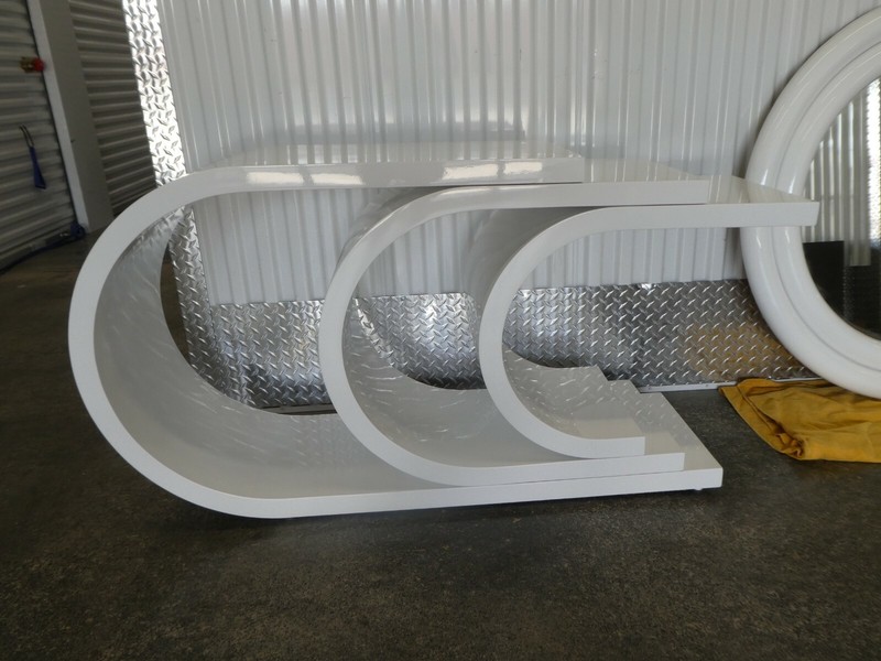 1970'S MOD WHITE LACQUER OVERLAPPING C'S CONSOLE AND MIRROR gallery