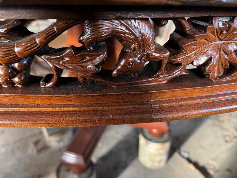 Antique 60" Round Table with hand carved apron gallery