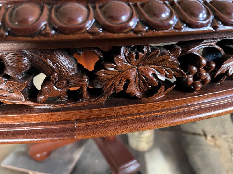 Antique 60" Round Table with hand carved apron gallery