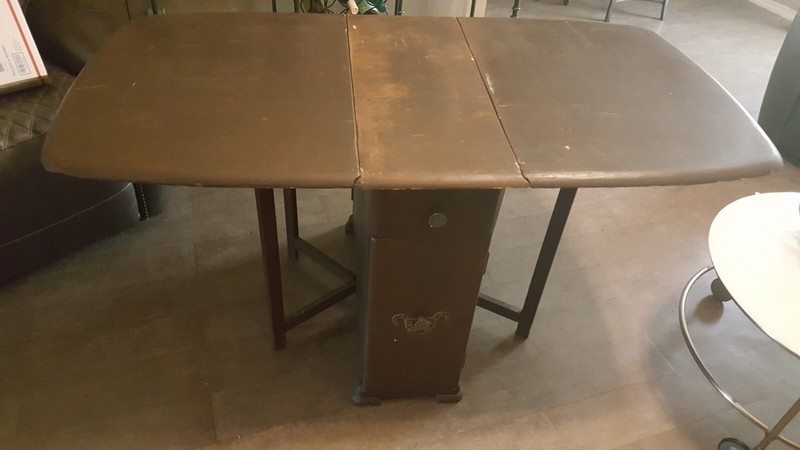 Antique drop leaf table with drawers