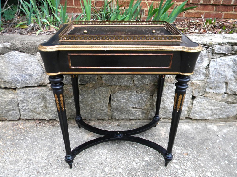 A ‘rough’ Jeanne Reed’s lidded ormolu table with brass gallery