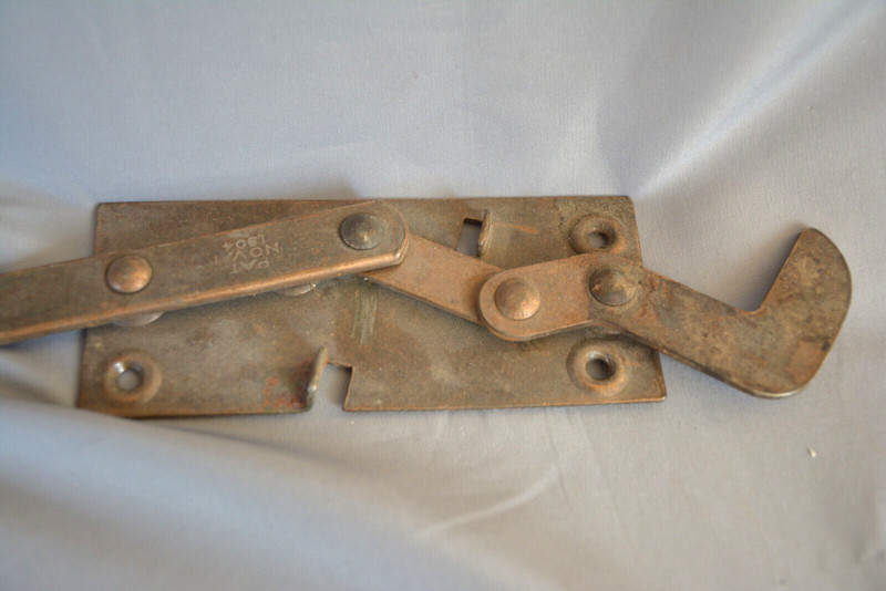 ANTIQUE 1904 COPPER PLATED CAST IRON DINING TABLE MECHANISM gallery
