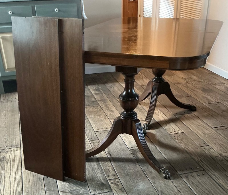 Duncan Phyfe antique dining table , 36"x56" plus 2- 12" leaves included.