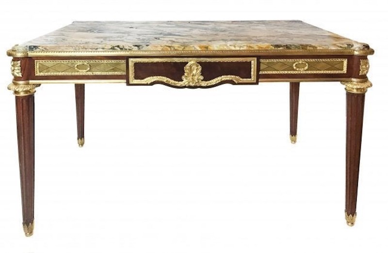 A Louix XVI style gilt-bronze mounted mahogany center table Paris, circa 1890