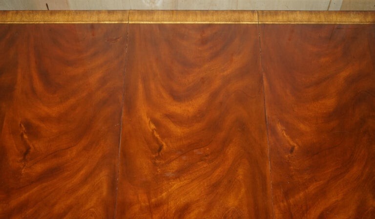 Flamed Mahogany & Walnut Based Tripod Extending Dining Table Brass Castors gallery