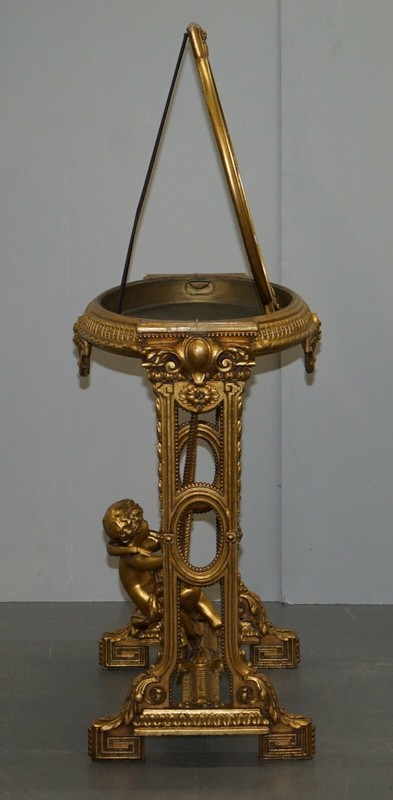 CIRCA 1920 GOLD GILTWOOD OCCASIONAL TABLE WITH MIRROR TOP & CHERUB PUTTI SWING gallery