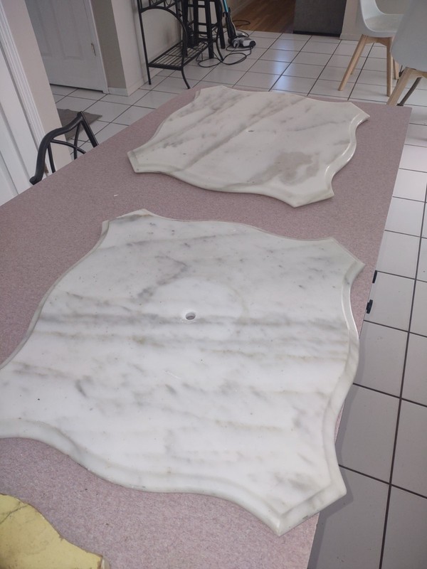 Marble tables with ornate cherubs..local pick up gallery