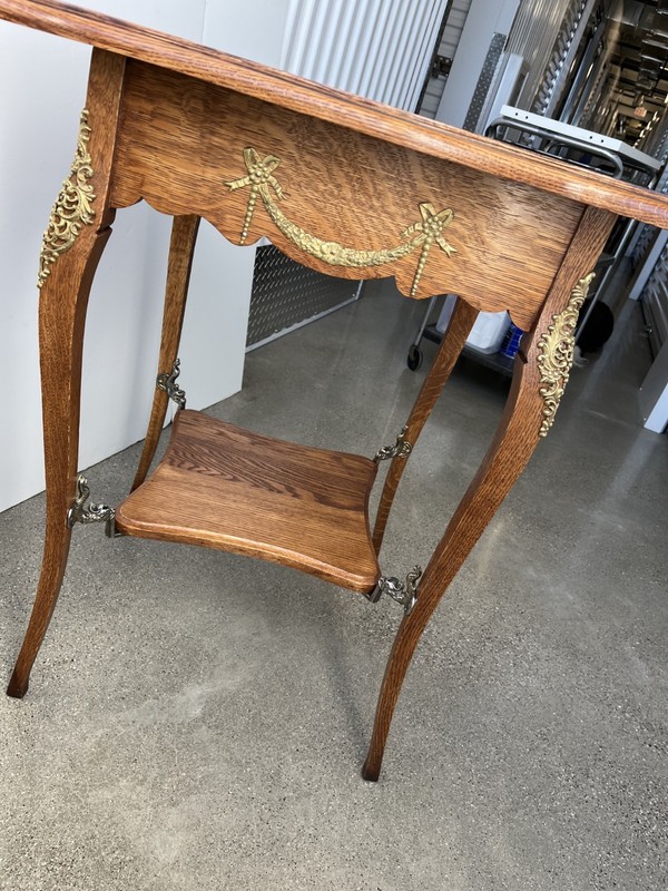 Antique French Louis XV oak accent table with shelf, ormolu and dolphin mounts gallery