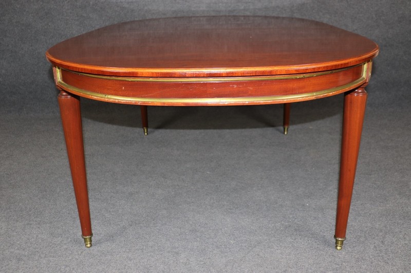 Superb French-Made Maison Jansen Attributed Brass Mounted Mahogany Dining Table gallery