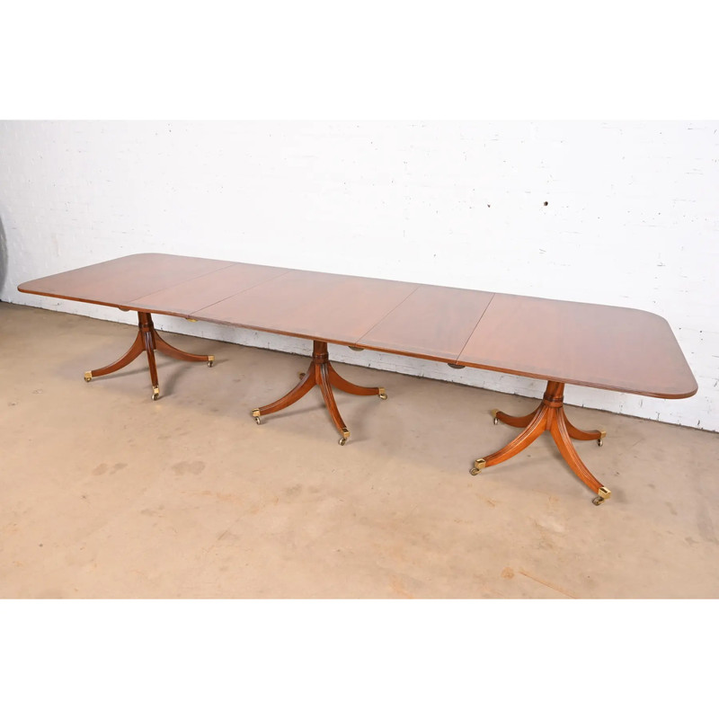 Baker Furniture Style Georgian Banded Mahogany Triple Pedestal Dining Table