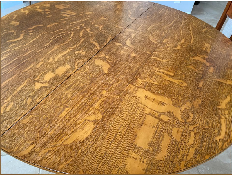 Dining table in Vintage Tiger Oak. 48" wide with three 12" leaves. Veneer top. gallery