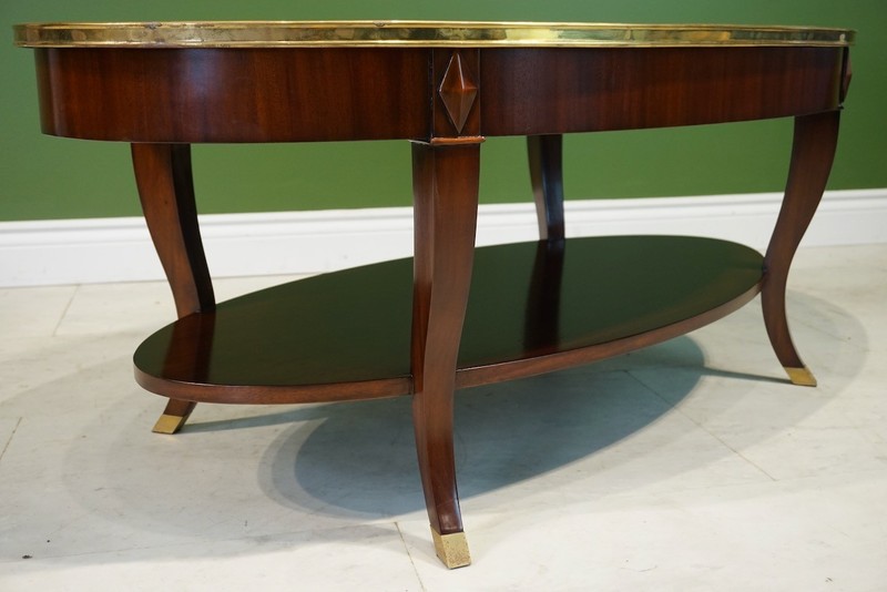 Oval Mahogany Coffee table with brass banding, lower shelf, solid marble top gallery