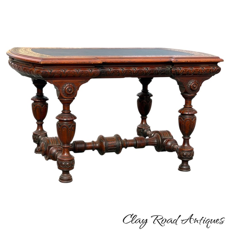 Antique victorian aesthetic heavily carved walnut center table writing leather