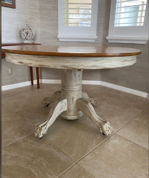 Dining table in Vintage Tiger Oak. 48" wide with three 12" leaves. Veneer top. gallery