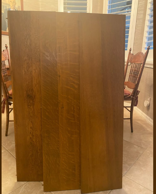 Dining table in Vintage Tiger Oak. 48" wide with three 12" leaves. Veneer top. gallery