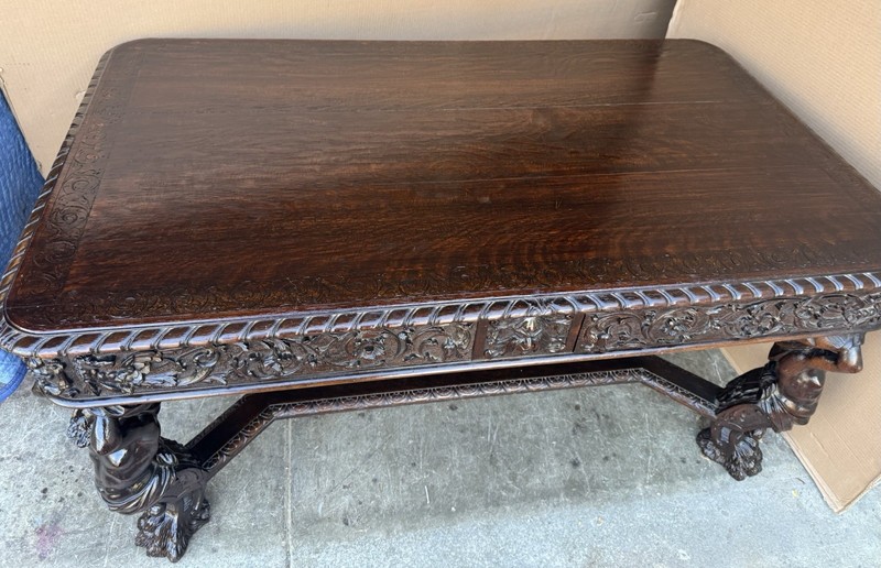 R. J. HORNER CARVED OAK ATLAS LIBRARY TABLE gallery