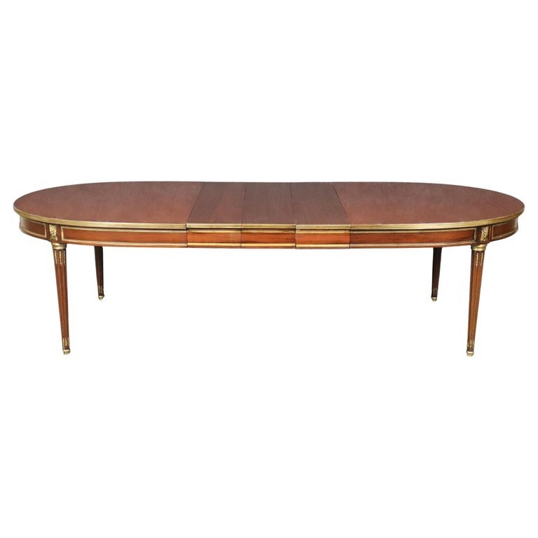 Signed Maison Jansen Brass and Bronze Adorned Mahogany Dining Table with 3 Leave
