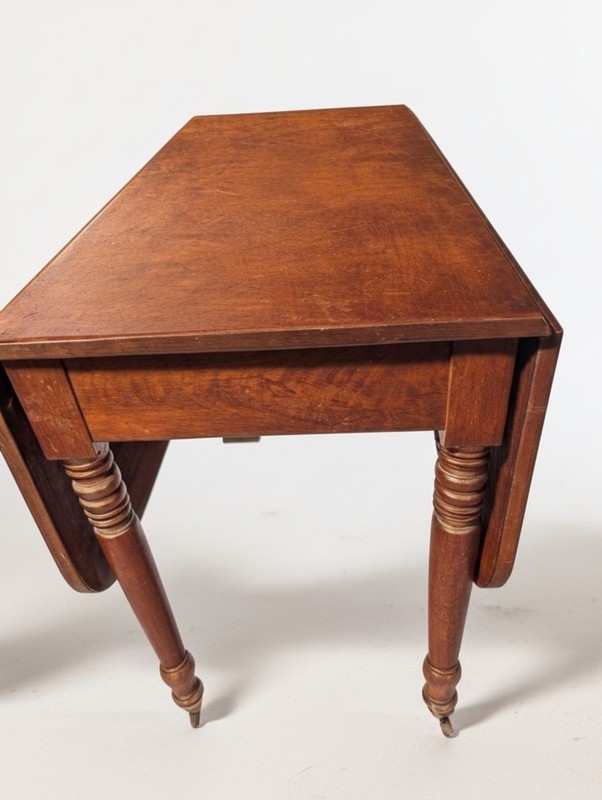 Antique Sheraton drop leaf table 42 inch with mahogany turned legs