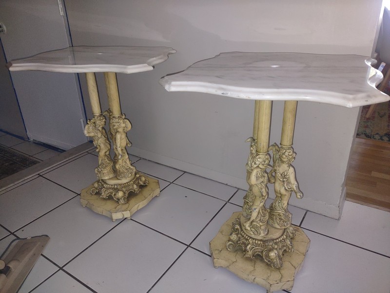 Marble tables with ornate cherubs..local pick up