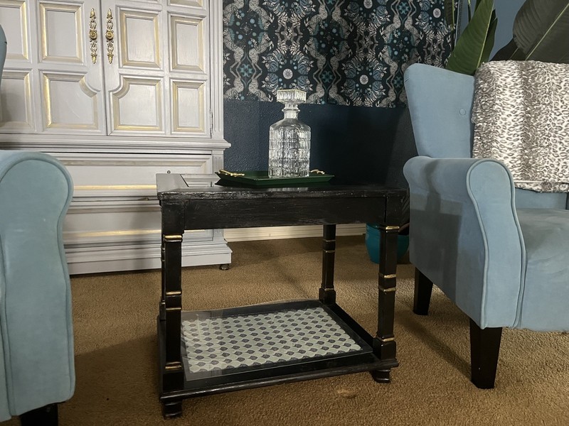 Vintage black and gold hand painted end table/drinks table with glass top