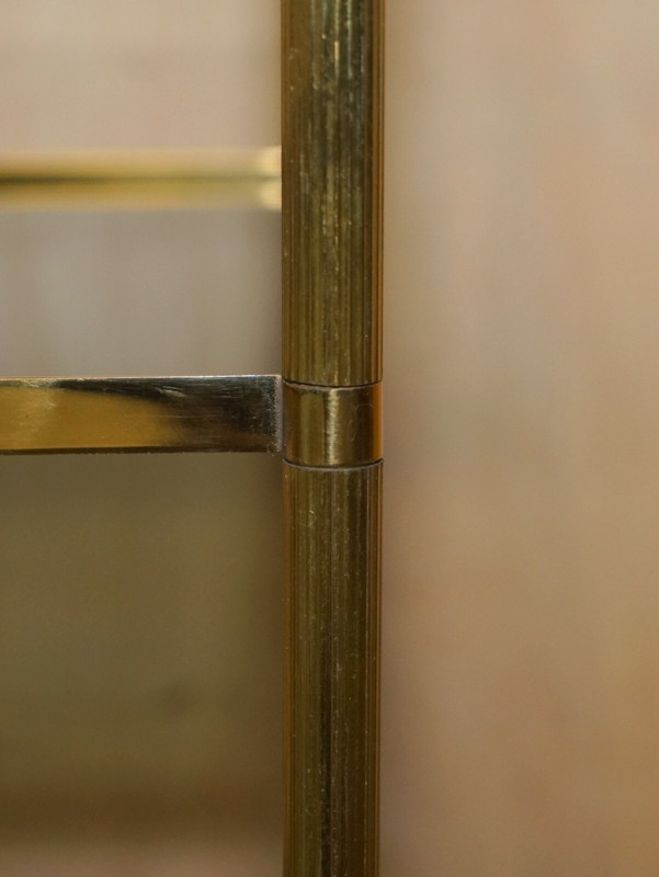 FINE PAIR OF MID CENTURY MODERN BRASS AND SMOKED GLASS THREE TIER ETAGERE TABLES gallery