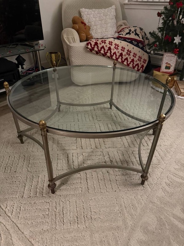 1970s Italian brass & glass round coffee table, attributed to Maison Jansen.