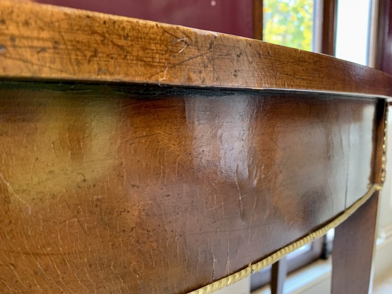 Antique Demilune Console Tables With Brass Ormolu Mounts—A Pair gallery